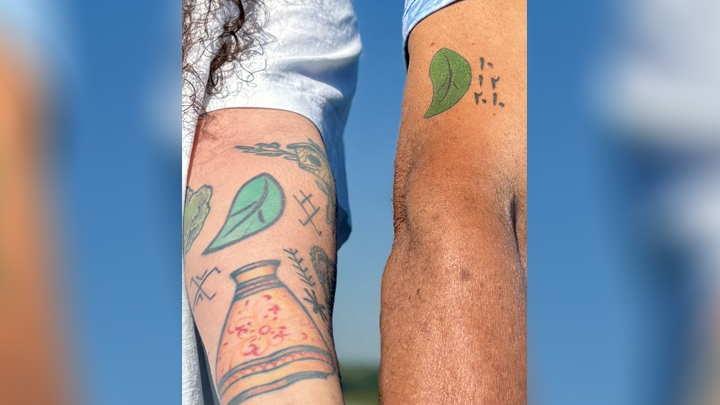 Rhekia and Saad Fahssi show off their matching tattoos, symbolizing living donation. Rhekia donated a kidney to Saad in 2010, saving her dad’s life.