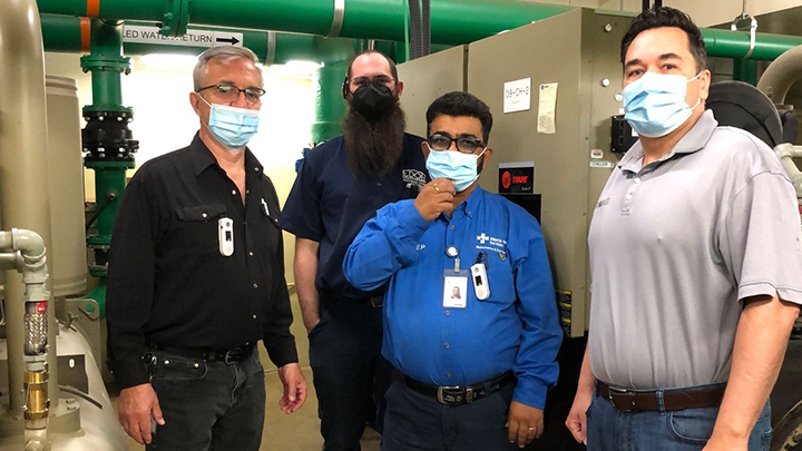Members of the Fort McMurray Facilities, Maintenance and Engineering (FM&E) team — Jim Ireland, left, Rylan Barlow, Sundeep Sharma and Jimmy Aumont — regularly review emergency preparedness and response plans.