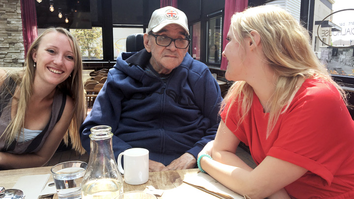 Amy Berlinguette, left, and Kaylin Berlinguette enjoy a meal with their grandpa Gordon Gross. He came down with COVID-19 early in the pandemic, and the family feared they would lose him. Today, Gross is slowly recovering and living with the effects of Long COVID.