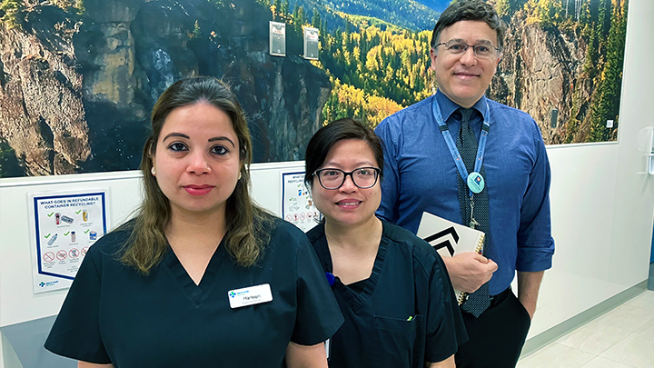 Nutrition and Food Services team members Harleen Heer Sran, left, Alona Estacio and Hisham Karami focus on bringing the patient voice into their work through bedside menu selection at the hospital.