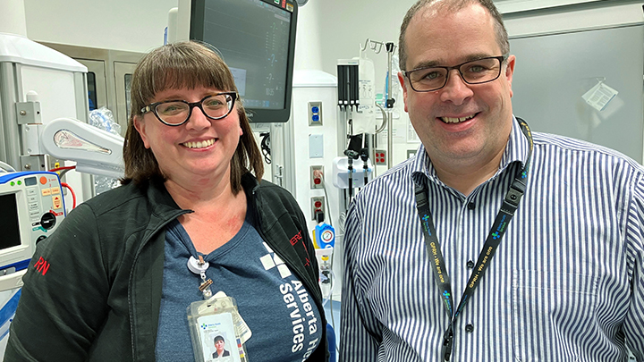 Greg Schmidt, director of patient care, and Carla Reany, GPRH emergency department unit manager, visit one of the unit’s trauma bays. They are members of the team involved in improving the patient experience here.