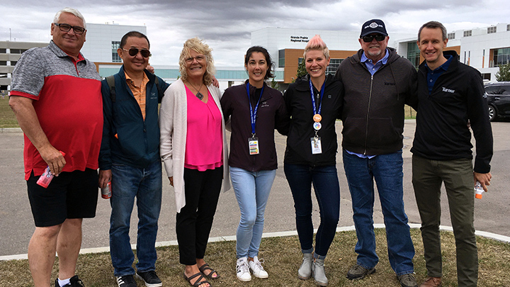 Members of the Grande Prairie Regional Hospital planning team gather with representatives from Alberta Infrastructure, Clark Builders and Dialogue Design.