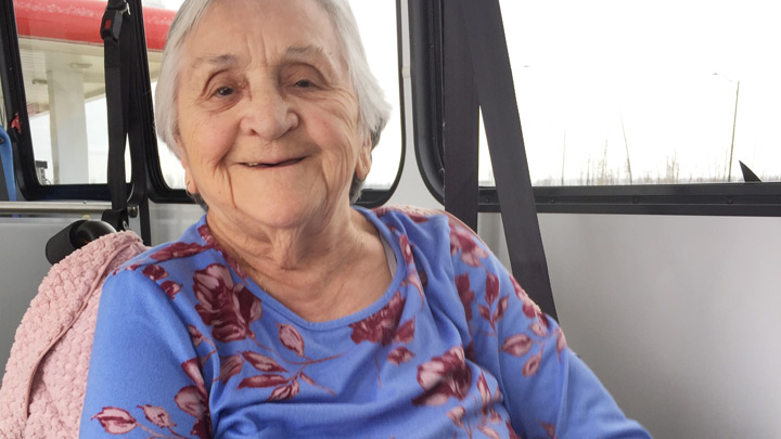 Willow Square Continuing Care Centre resident Geraldine Decker is all smiles while riding the new handibus.