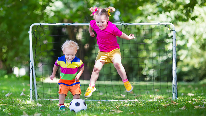 Activity is key to keeping toddlers happy and healthy. Luckily, at this age, a simple game of kick the ball helps them explore their environment.