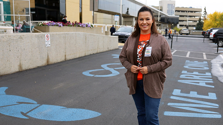 Patients and families arriving to the Royal Alexandra Hospital will be met by a newly-painted Truth and Reconciliation crosswalk honouring Indigenous peoples. Dorothy Anderson, a senior advisor with the Indigenous Wellness Core, says she hopes it will be first of many to be proudly displayed at AHS facilities across the province.