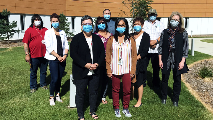 Members of the Grande Prairie Regional Hospital Indigenous Engagement Committee pose on the grounds after taking a tour of the new hospital last year.