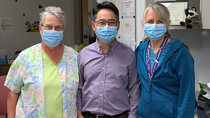 Jo-Anne Doll, left, seen here radiologist Dr. Hojun Yu and senior diagnostic imaging technologist Kim Ruether, has retired after a 50-year career in diagnostic imaging at the Fairview Health Complex. “You get to know your patients, you get to know their kids.”