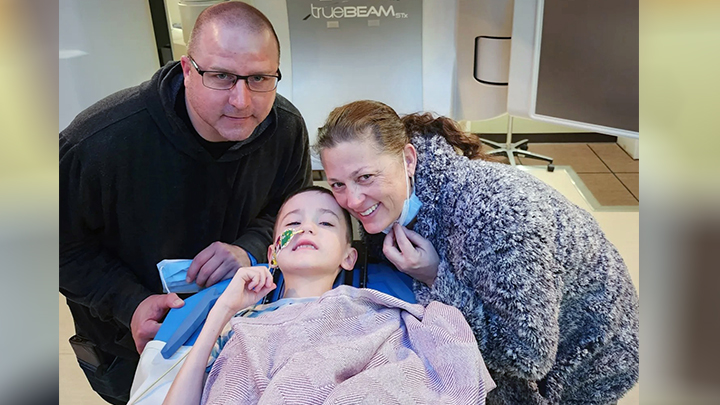 Karter Bourgeault with his parents, Richard Bourgeault and Nicole Fraser.