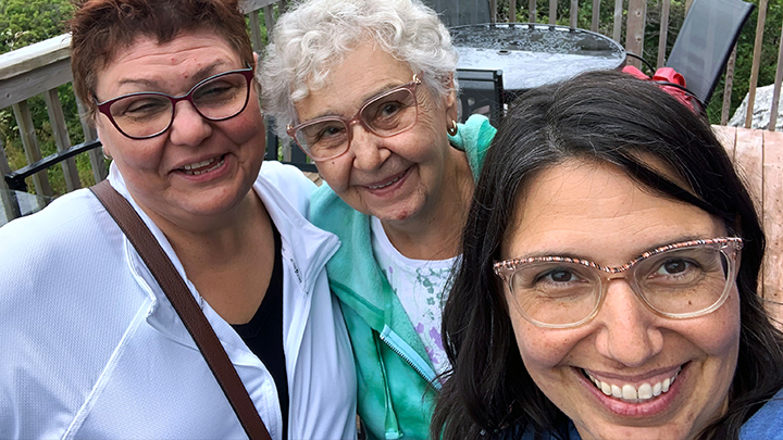 Karyn Wog, left, was recently able to travel to Peggy’s Cove in Nova Scotia with her mother and sister — the first time she’d seen them in years.