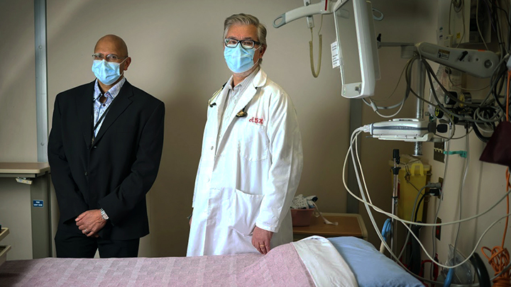 Dr. Vikas Kuriachan, left, interim zone clinical department head of Cardiac Sciences, and Dr. Andrew Howarth, section chief for Cardiology in the Calgary Zone, worked together to successfully establish a care model that supports programs through the integration of alternate care providers such as clinical assistants, physician assistants and nurse practitioners.
