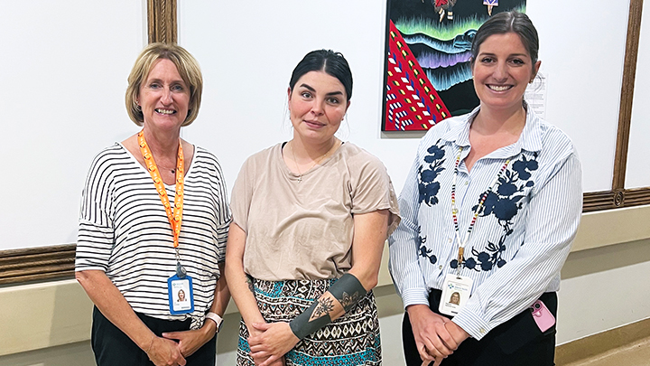 These three paintings were created by Kaitlin Littlechilds, centre, a Métis artist from the Kikino Metis Settlement, and have been on display at the Lac La Biche Healthcare Centre since May. Lisa Sparks, left, site manager, and Natalie Cloutier, right, care manager, recently met with Littlechilds to unveil her artwork in the centre’s main foyer.