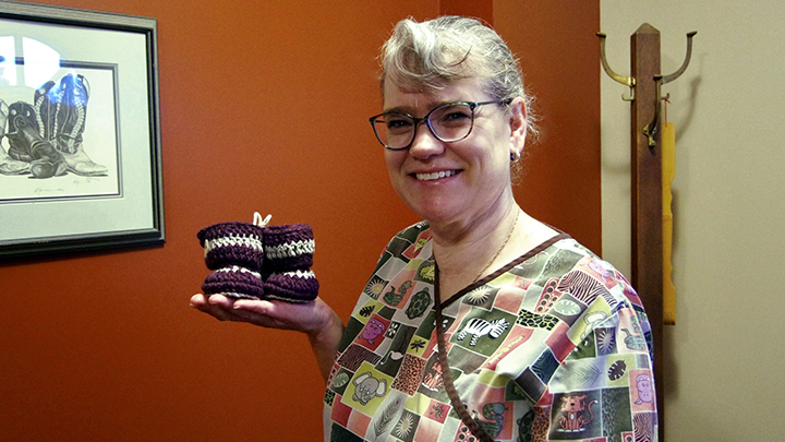 Lori Watt brings a personal touch, and sometimes a hand-made gift of baby booties, to her work as a medical lab assistant with Alberta Precision Laboratories at Three Hills Health Centre.