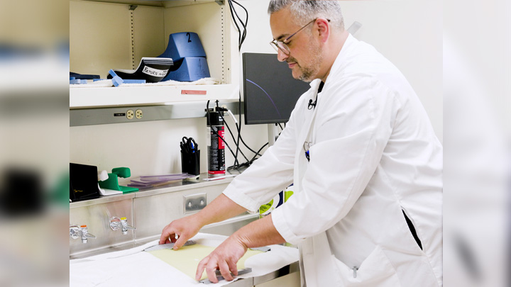 Long before a paintbrush touches plastic, Brandon Aboughoche is already at work, moulding the plastic for a child’s mask. A radiation therapist with more than 20 years at Cancer Care Alberta, he’s often the first person a child meets.