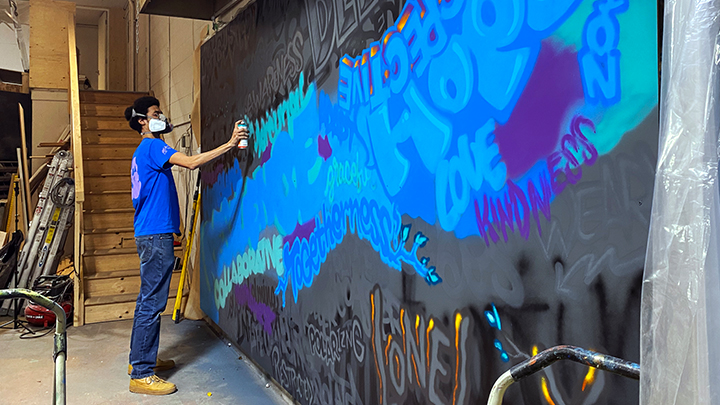 Edmonton artist AJA Louden at work, creating a powerful mural celebrating our healthcare heroes. It will be on display at the McMullen Gallery in the University of Alberta Hospital through August.