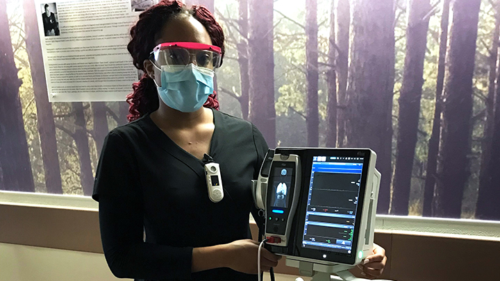Chioma Igbokei, a Licensed Practical Nurse who works on the Medicine unit at the Northern Lights Regional Health Centre in Fort McMurray, finds the new patient vital signs monitoring equipment to be very user-friendly.