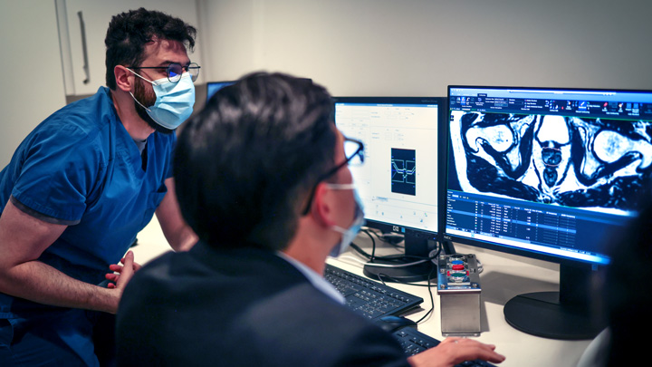 The care team scans the detailed images during a training session on the MR-Linac.