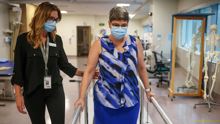 Vanessa Jollimore works on improving her walk under the guidance of physiotherapist Jacquie Townsend.
Photo credit: Photo by Leah Hennel
