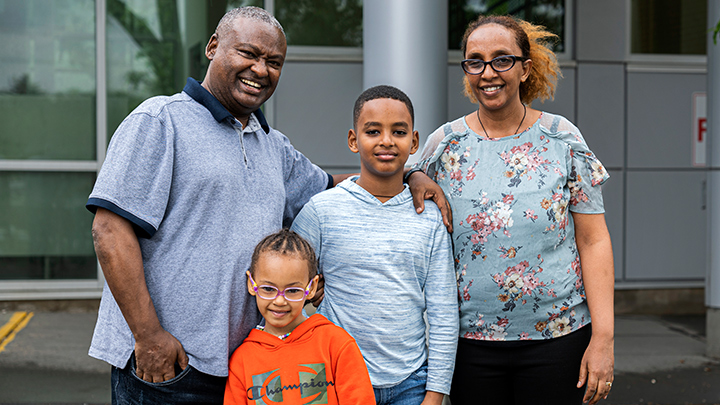 Biru Mengesha Shiferaw, left, and Elisabethe Shenkoru Tessem arrived in Canada in August 2021 with their children Getachew, middle, and Lielt, in front. They left their home in Ethiopia in search of a safe place to live and are grateful for the welcome they’ve received in Edmonton, including help from both AHS Public Health and the New Canadians Health Centre.