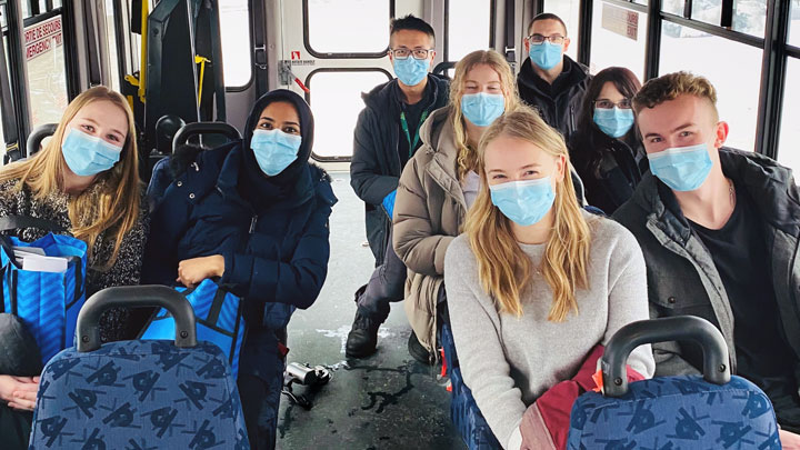 University of Calgary nursing students were treated to a local bus tour when they arrived in January for their practicums at the Northwest Health Centre in High Level and St. Theresa General Hospital in Fort Vermilion. Shown are: Rachael Gerdias and Hafsa Syed (left side of aisle); Paige Hutton and Zachary Eastman (front row on right side of aisle); Aleena Copithorne and Tegan Hills (middle row, right side) and High Level Allied Health physiotherapist Yufei (Steve) Cui and occupational therapist William Fitzgerald (rear row, right side). 