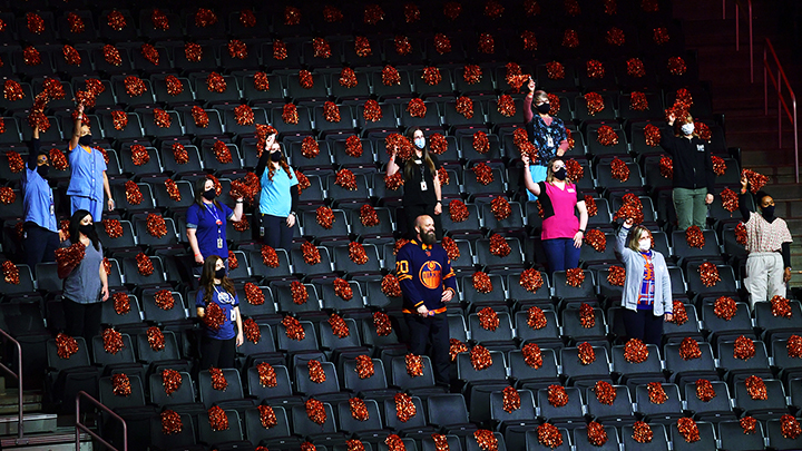 A dozen randomly-selected AHS frontline healthcare workers joined the Edmonton Oilers’ anthem singer in the stands of Rogers Place to watch the May 12 NHL playoff game against the Winnipeg Jets.