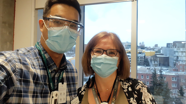 Unit manager Andrew Kwan and clinic manager Samantha Perryman came together as part of the team that redeployed to the Pandemic Response Unit at Kaye Edmonton Clinic in January and February.