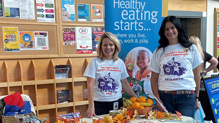 Public Health dietitian Shelley Cooper, left, and Health Promotion facilitator Rania Page promoted healthy activity and eating as part of Red Deer's bid in the ParticipACTION Community Better Challenge during an event at the Collicutt Centre.