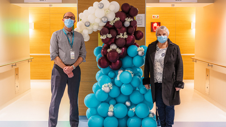 Patient Dorene Binks, right, strikes a happy pose with Kyle Connely, manager of Radiation Therapy at the new Grande Prairie Regional Hospital.