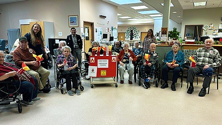 Continuing Care residents in Radway celebrate at a welcome home party after their return from a wildfire evacuation. Surrounded by balloons, music and smiling faces, they gathered with staff and family members to mark the happy occasion.