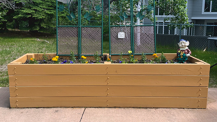 One of the flower boxes built by woodworker Kyle Bilton is shown earlier this year.