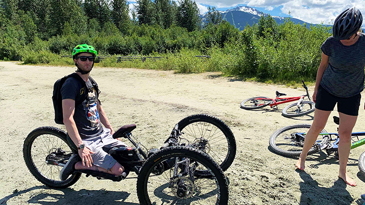 Respiratory therapist Matt MacKay rides an adaptive bike in Whistler, B.C., one year after suffering a traumatic spinal cord injury in a mountain-biking accident.