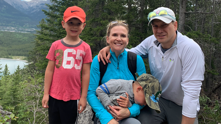 Dr. Corey Adams, right, a cardiac surgeon at Foothills Medical Centre, enjoys an outing with his family at Grassi Lakes. Adams administered lifesaving CPR on Darrell Parker at Grassi Lakes and then performed the man’s bypass surgery just days later, saving Parker’s life not once, but twice.