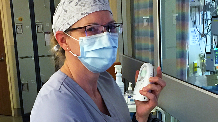 Joanne Shepherd, an ICU nurse at QEII Hospital, demonstrates the use of an audio monitor. A donation from Seven Generations Energy to the Grande Prairie Regional Hospital Foundation will fund 27 new audio monitors as well as other equipment.