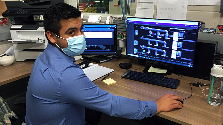 Brendan Martins of Facilities, Maintenance & Engineering (FM&E) at Grande Prairie Regional Hospital demonstrates how to activate the “smudge button” at the new hospital.