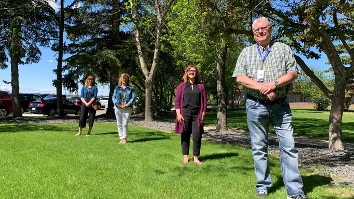 Maintaining physical distance from each other as they keep their clients connected to care are members of the Lethbridge Addiction and Mental Health Outreach Team, from right: Jim McCran, Tammie Efraimson-Hiraga, Brandy Tonin and Janet Innes.