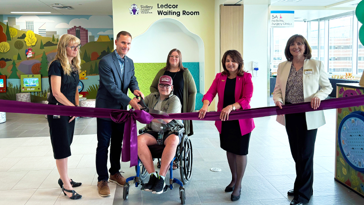 Supporters cut the ribbon at the new Stollery Surgical Clinic.