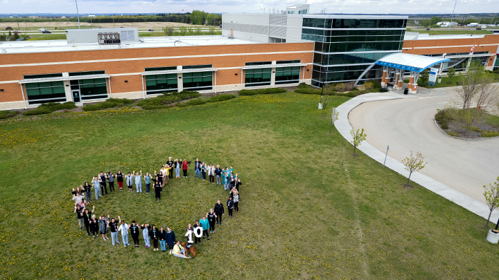 Staff gather on the grounds to reflect the ‘big heart’ of Strathcona Community Hospital.
