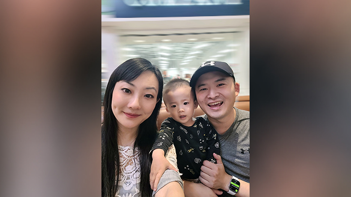 Cynthia, baby Eddie and Steven Tse strike a happy family pose