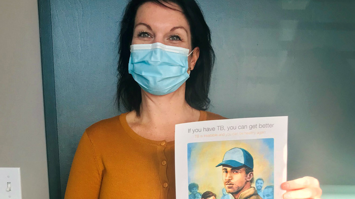 Jennifer Splaine, area manager for Fort McMurray Public Health, shows off one of four prevention-focused tuberculosis resources that are now available with Alberta Health Services. Public health developed them in partnership with AHS TB Services and AHS Communications and Community Engagement, and with in-kind funding and support from the University of Alberta’s Tuberculosis Program Evaluation and Research Unit.