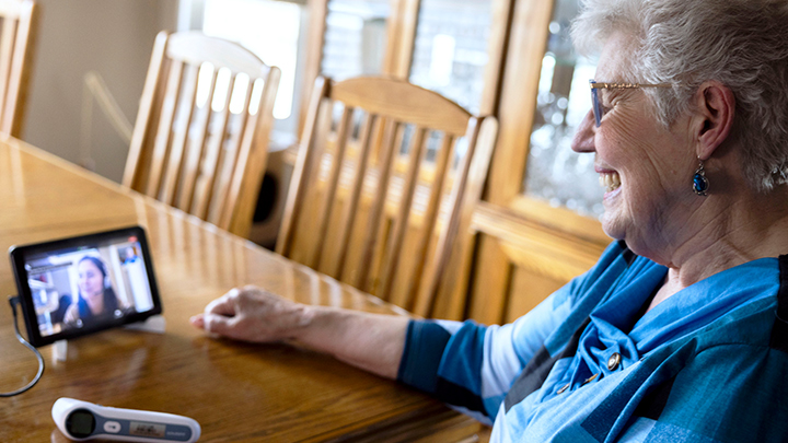 Registered nurse Abigail Sumagit (on screen) and patient Inge Westlin connect virtually using one of the virtual tools provided by the EZVHH. Virtual check-ins by members of the care team with their patients are key to staying connected throughout a patient’s care journey. 