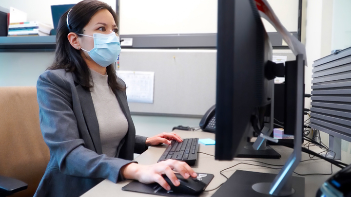 Dr. Jenny Edge, a physician with the Virtual MD pilot program, supports Health Link callers across the province by offering virtual appointments.