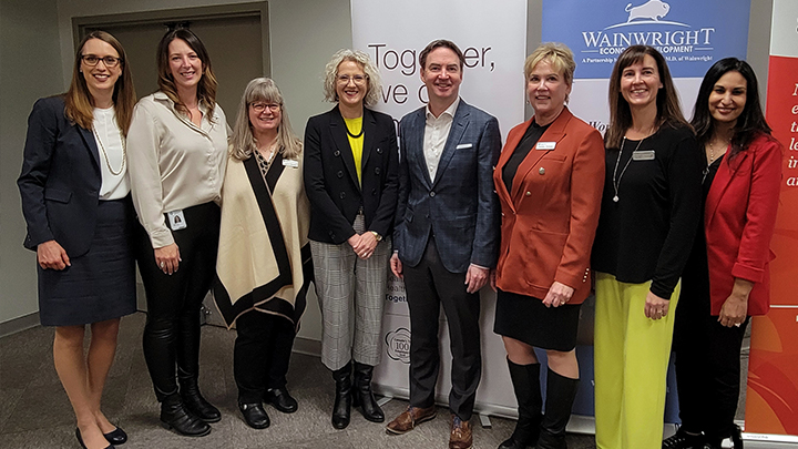 Program partners in attendance at a December celebration of the second year of the RN program included, from left: Dr. Heather Bensler, UCalgary Academic Partnership assistant dean; Jamie Malone, former Wainwright AHS area director; Janice Stewart, AHS Central Zone chief zone officer; Dr. Sandra Davidson, UCalgary Faculty of Nursing dean; Jason Copping, Alberta Health Minister; Carolyn Trumper, AHS executive director and BN program steering committee co-chair; Carley Hebert, Wainwright Economic Development officer; and Dr. Zahra Shajani, UCalgary associate dean and BN program steering committee co-chair.