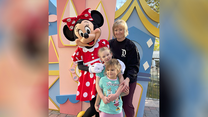 Just two months after having hip-replacement surgery in Westlock, and going home the same day, Mona Koberstein travelled to Disneyland with her family. Here she makes a precious memory with her granddaughters Natalie and Rachel, along with the famous Minnie Mouse.