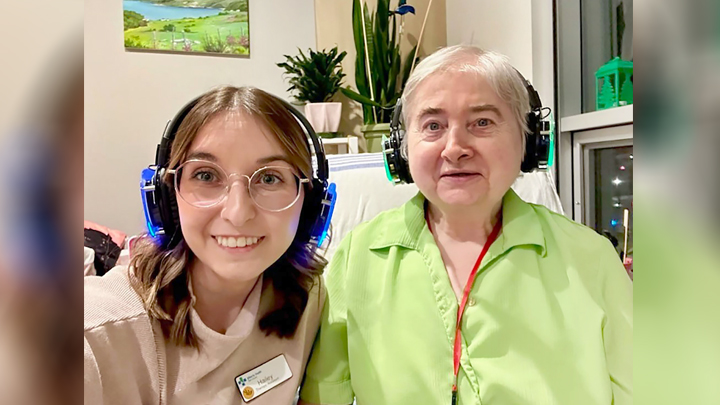 Therapy assistant Hailey Kanak, left and resident Elspeth Colliar show off their new Sound Off headphones at Willow Square Continuing Care Centre.