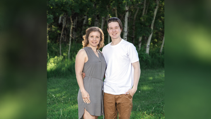 Zachary Trimm and his mother, Kinza Barney, strike a happy pose on a family outing before his untimely death.